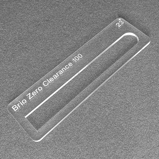 Brio zero clearance 100 template for routing out the 23mm wide hanger brackets in the top of the door. Used with the TIDY TRADIE Router Jig 1.0 & 2.0.