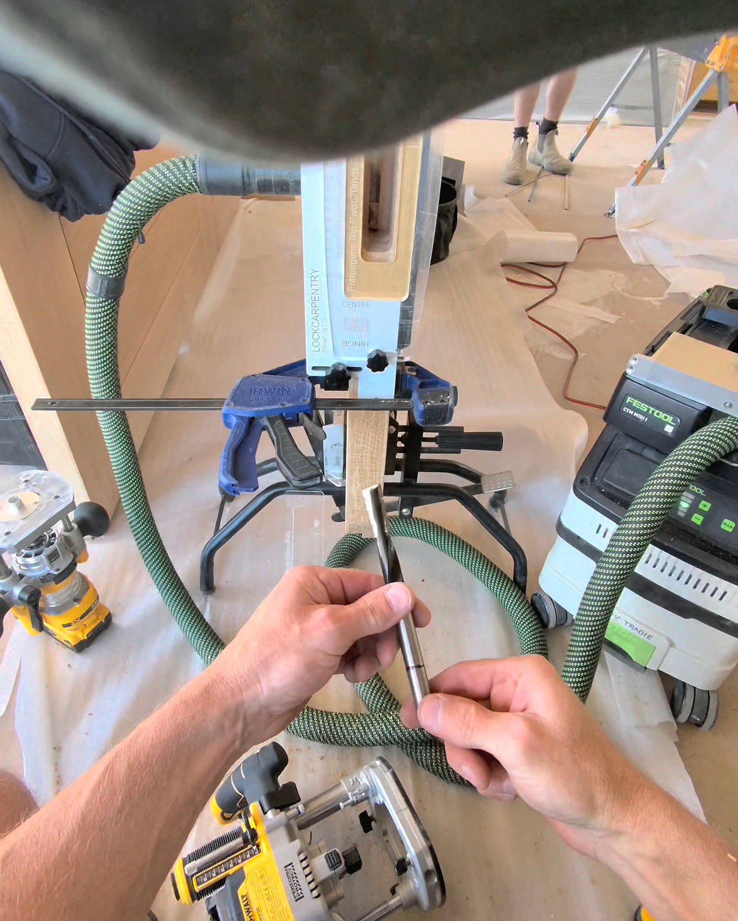 The Lockcarpenter holding a 160mm long plunge tip router bit.
